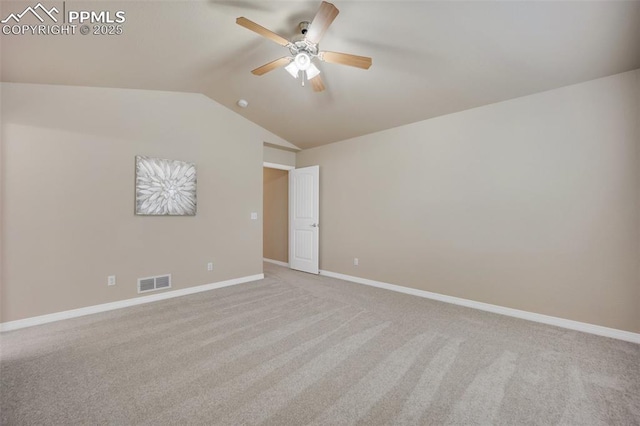 6259 Bearcat Loop, Colorado Springs, CO 80925 - carpeted spare room with ceiling fan, vaulted ceiling, and baseboards