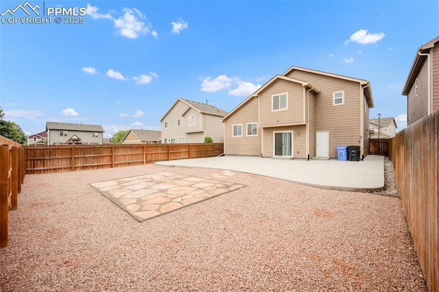 6259 Bearcat Loop, Colorado Springs, CO 80925 - rear view of property featuring a patio, a fenced backyard, and a residential view