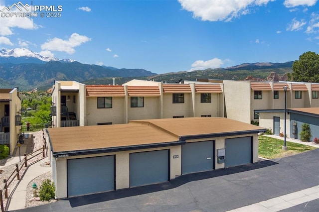 954 Fontmore Rd Unit B, Colorado Springs, CO 80904 - view of front facade featuring a mountain view and stucco siding