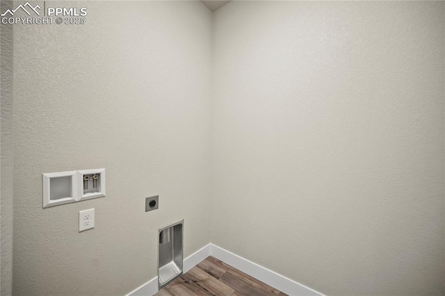 3065 Curly Grv, Colorado Springs, CO 80922 - clothes washing area featuring hookup for an electric dryer, baseboards, wood finished floors, and washer hookup