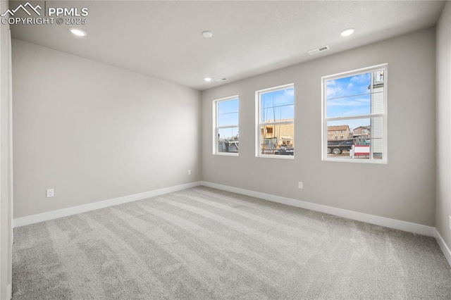 3065 Curly Grv, Colorado Springs, CO 80922 - unfurnished room featuring carpet, baseboards, and recessed lighting
