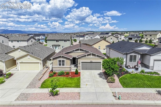 9095 Vanderwood Rd, Colorado Springs, CO 80908 - view of front of house featuring a residential view, driveway, an attached garage, and a front yard