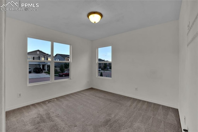 9095 Vanderwood Rd, Colorado Springs, CO 80908 - unfurnished room with carpet floors