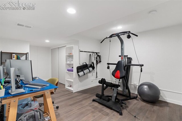 1107 Parkview Blvd, Colorado Springs, CO 80905 - exercise room featuring baseboards, wood finished floors, and recessed lighting