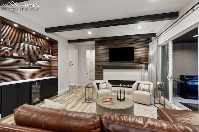 16244 Thunder Cat Way, Monument, CO 80132 - living area featuring wine cooler, bar area, beamed ceiling, recessed lighting, and light wood-style flooring