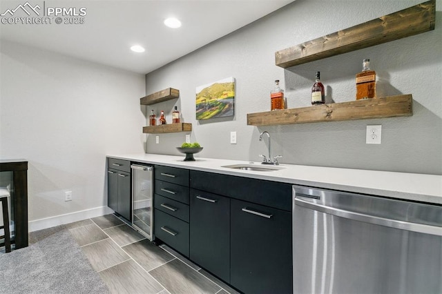 16244 Thunder Cat Way, Monument, CO 80132 - indoor wet bar featuring dishwasher, wine cooler, recessed lighting, and baseboards