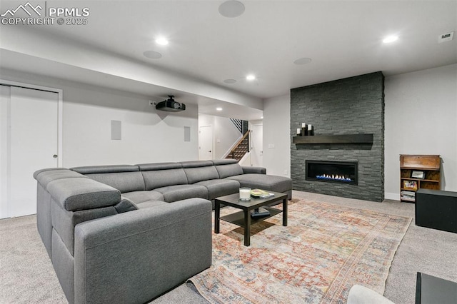 16244 Thunder Cat Way, Monument, CO 80132 - carpeted living area with recessed lighting, stairs, and a fireplace