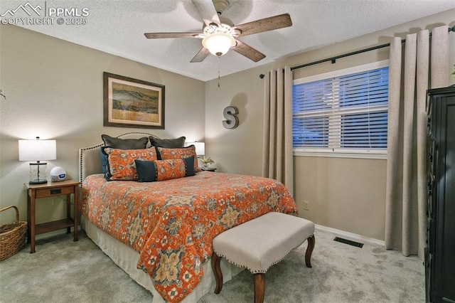 9131 Estebury Cir, Colorado Springs, CO 80920 - bedroom featuring carpet floors, baseboards, a textured ceiling, and ceiling fan