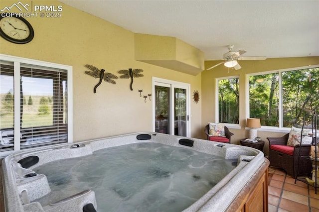 9131 Estebury Cir, Colorado Springs, CO 80920 - sunroom / solarium with a jacuzzi and lofted ceiling