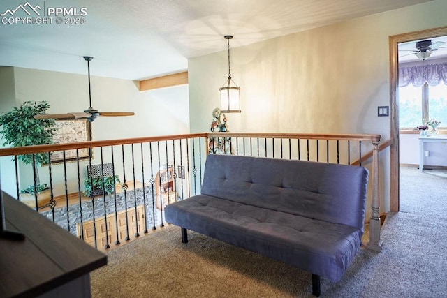1120 Brenthaven Ct, Monument, CO 80132 - living area featuring ceiling fan, carpet, and an upstairs landing