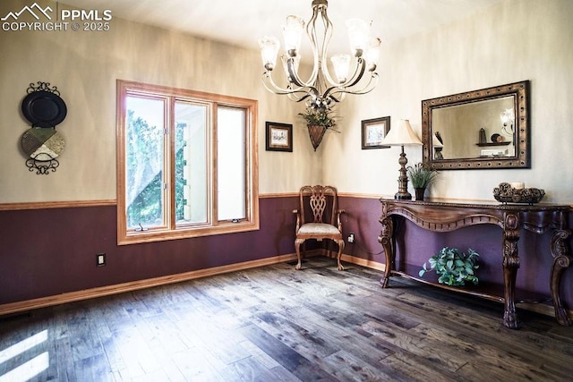 1120 Brenthaven Ct, Monument, CO 80132 - sitting room with a chandelier, wood finished floors, and baseboards