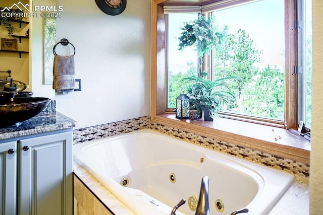 1120 Brenthaven Ct, Monument, CO 80132 - full bath with a jetted tub, plenty of natural light, and vanity