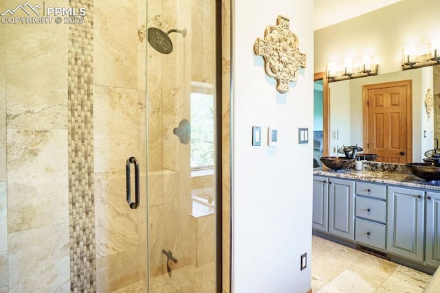 1120 Brenthaven Ct, Monument, CO 80132 - bathroom with a stall shower and double vanity