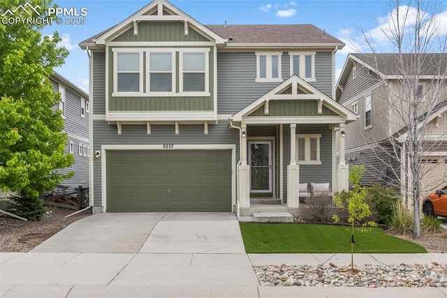 8257 Plumwood Cir, Colorado Springs, CO 80927 - craftsman-style house with an attached garage, driveway, a front lawn, and board and batten siding