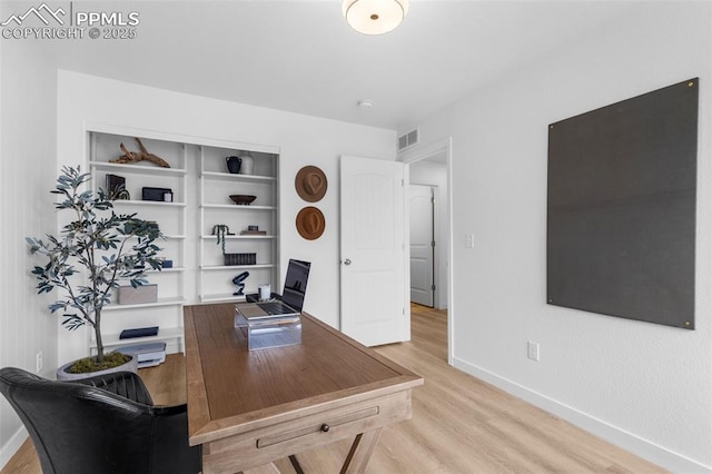8257 Plumwood Cir, Colorado Springs, CO 80927 - office area featuring wood finished floors and baseboards