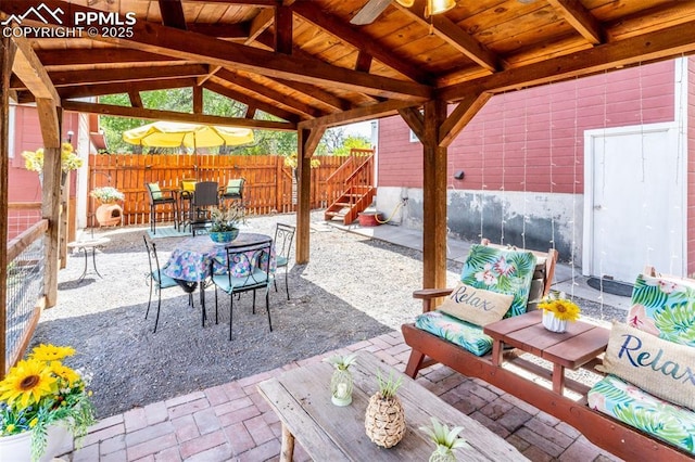 521 W Corona Ave, Pueblo, CO 81004 - view of patio / terrace with a gazebo, fence, and outdoor dining space