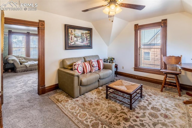 521 W Corona Ave, Pueblo, CO 81004 - living area featuring carpet, lofted ceiling, a ceiling fan, plenty of natural light, and baseboards