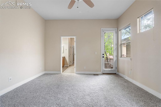 1076 Rosemary St, Denver, CO 80230 - unfurnished room featuring light colored carpet, a ceiling fan, and baseboards