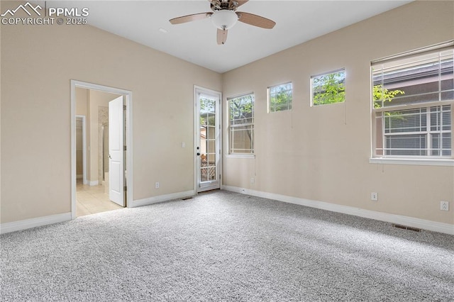 1076 Rosemary St, Denver, CO 80230 - carpeted empty room with a ceiling fan and baseboards
