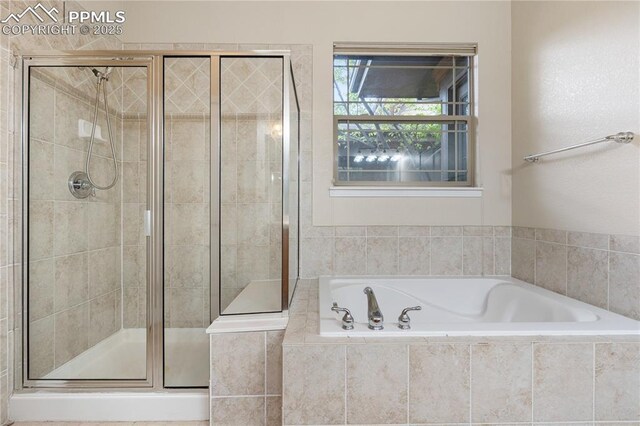 1076 Rosemary St, Denver, CO 80230 - full bathroom with a stall shower and a bath