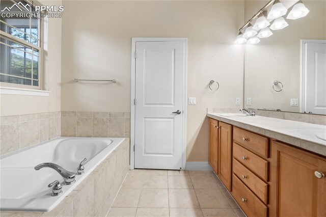 1076 Rosemary St, Denver, CO 80230 - bathroom featuring double vanity, a bath, and tile patterned flooring