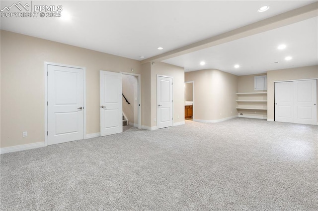 1076 Rosemary St, Denver, CO 80230 - finished below grade area with light carpet, recessed lighting, baseboards, and stairs