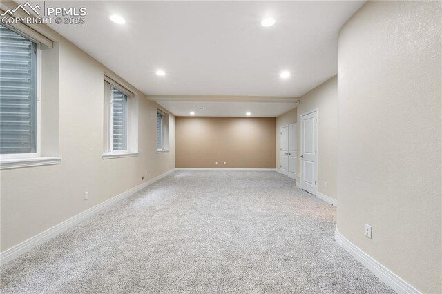 1076 Rosemary St, Denver, CO 80230 - carpeted empty room with recessed lighting and baseboards