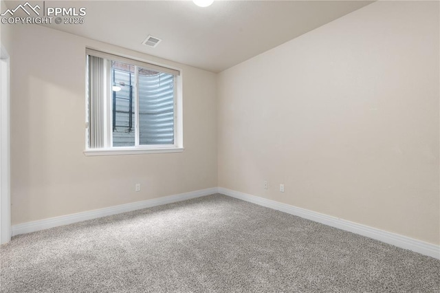 1076 Rosemary St, Denver, CO 80230 - spare room featuring carpet floors and baseboards