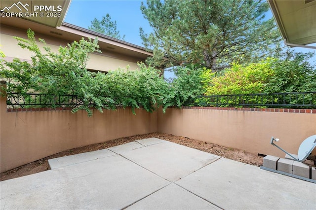 1076 Rosemary St, Denver, CO 80230 - fenced backyard with a patio