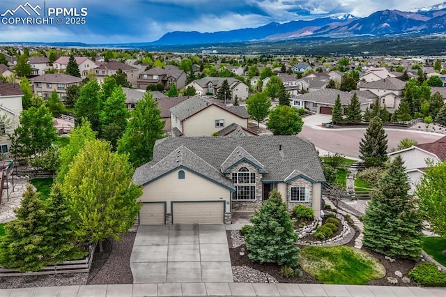 261 Saber Creek Dr, Monument, CO 80132 - aerial view of residential area with a mountain backdrop