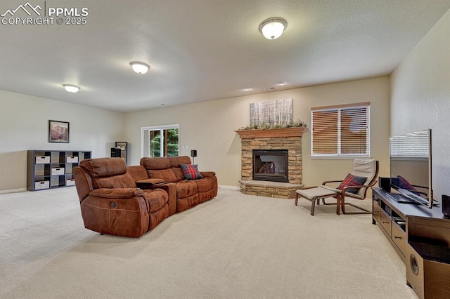 261 Saber Creek Dr, Monument, CO 80132 - carpeted living area with baseboards, a stone fireplace, and a textured ceiling