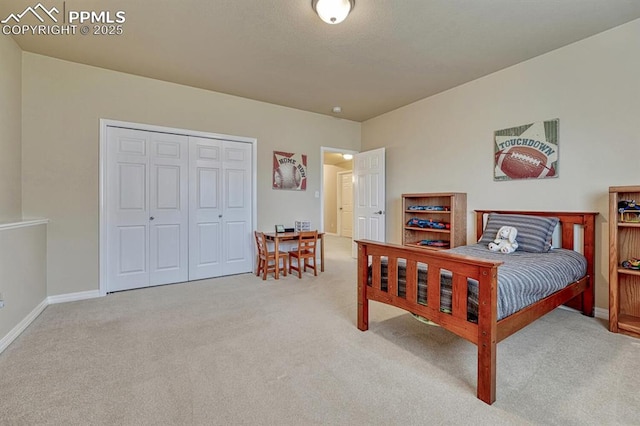 261 Saber Creek Dr, Monument, CO 80132 - carpeted bedroom featuring a closet and baseboards