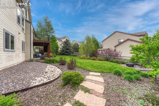 261 Saber Creek Dr, Monument, CO 80132 - view of yard featuring a deck and a patio