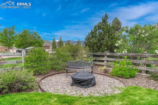 261 Saber Creek Dr, Monument, CO 80132 - view of yard featuring a fire pit and a mountain view