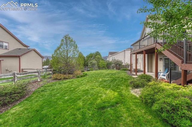 261 Saber Creek Dr, Monument, CO 80132 - view of yard with a wooden deck