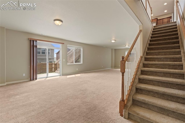 7031 Thorn Brush Way, Colorado Springs, CO 80923 - stairs with carpet floors, baseboards, and recessed lighting