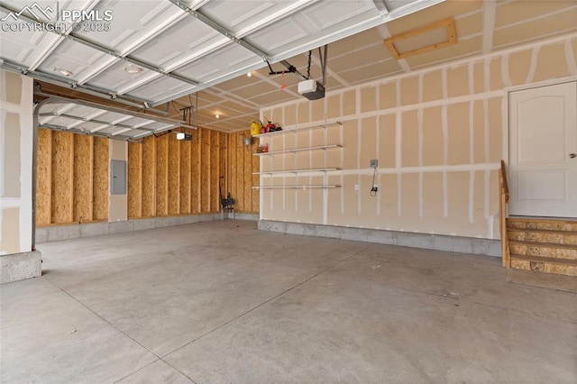 7031 Thorn Brush Way, Colorado Springs, CO 80923 - garage featuring electric panel and a garage door opener