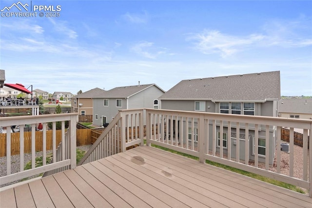 7031 Thorn Brush Way, Colorado Springs, CO 80923 - wooden terrace with a residential view
