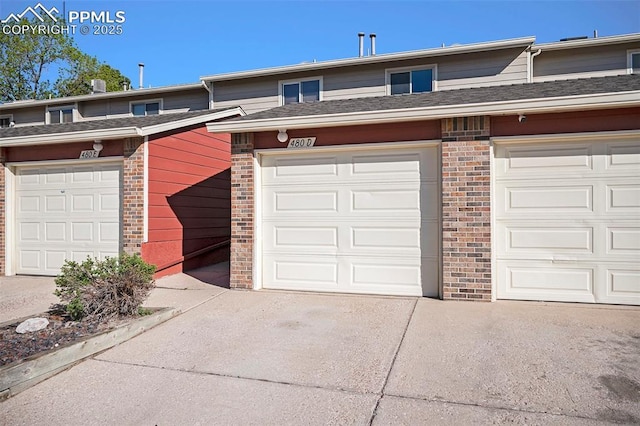 480 W Rockrimmon Blvd Unit D, Colorado Springs, CO 80919 - garage with driveway