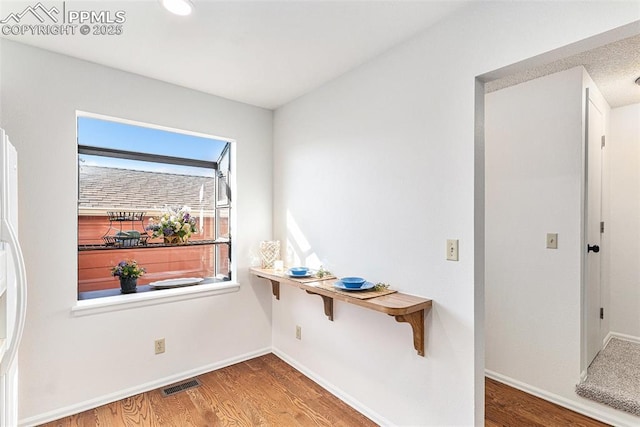 480 W Rockrimmon Blvd Unit D, Colorado Springs, CO 80919 - interior space featuring wood finished floors and baseboards