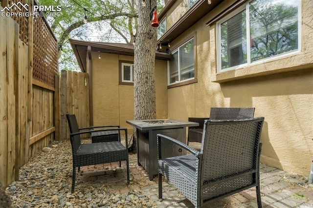 111 N 14th St, Colorado Springs, CO 80904 - view of patio / terrace with fence and an outdoor fire pit