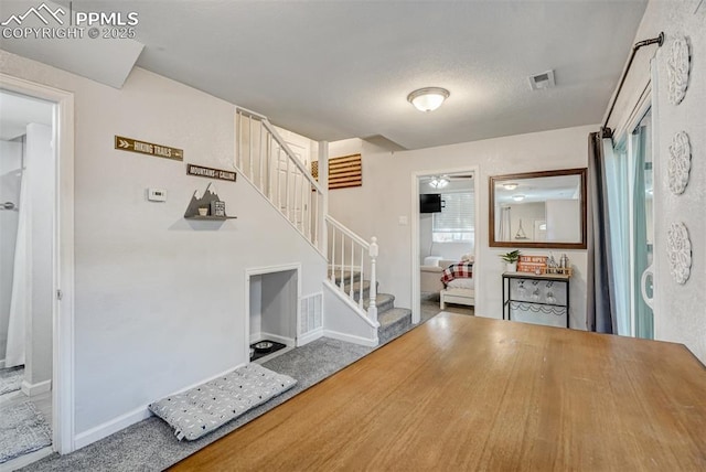 111 N 14th St, Colorado Springs, CO 80904 - entryway featuring stairway and baseboards