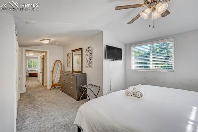 111 N 14th St, Colorado Springs, CO 80904 - bedroom featuring lofted ceiling, multiple windows, light carpet, and a ceiling fan