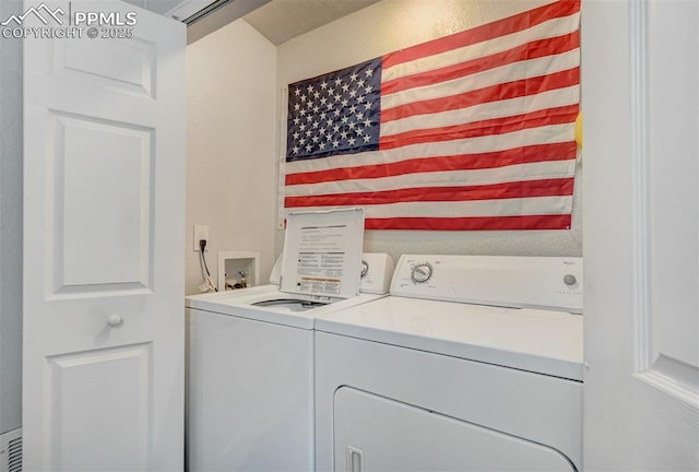 111 N 14th St, Colorado Springs, CO 80904 - clothes washing area with washer and dryer