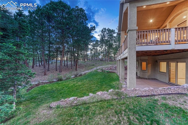 16150 Cliffrock Ct, Colorado Springs, CO 80921 - view of grassy yard featuring a patio area