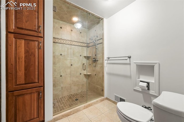 8020 Westwood Rd, Colorado Springs, CO 80919 - full bath with toilet, tile patterned flooring, a stall shower, and baseboards