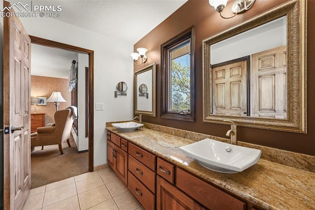 8020 Westwood Rd, Colorado Springs, CO 80919 - full bath with tile patterned flooring and double vanity