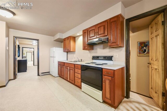 8020 Westwood Rd, Colorado Springs, CO 80919 - kitchen with range with electric cooktop, under cabinet range hood, freestanding refrigerator, light countertops, and a baseboard radiator