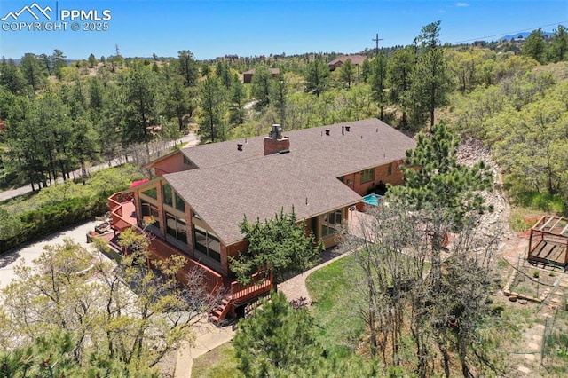 8020 Westwood Rd, Colorado Springs, CO 80919 - view from above of property featuring a heavily wooded area