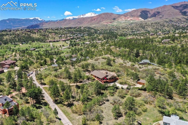 8020 Westwood Rd, Colorado Springs, CO 80919 - aerial view of property and surrounding area featuring a mountain backdrop